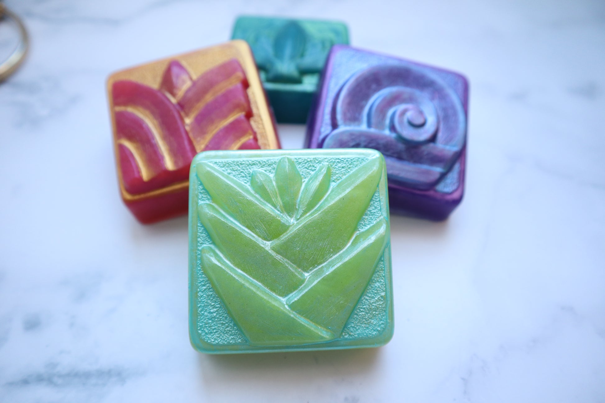 Bright and fun soaps made in this cubism soap mold